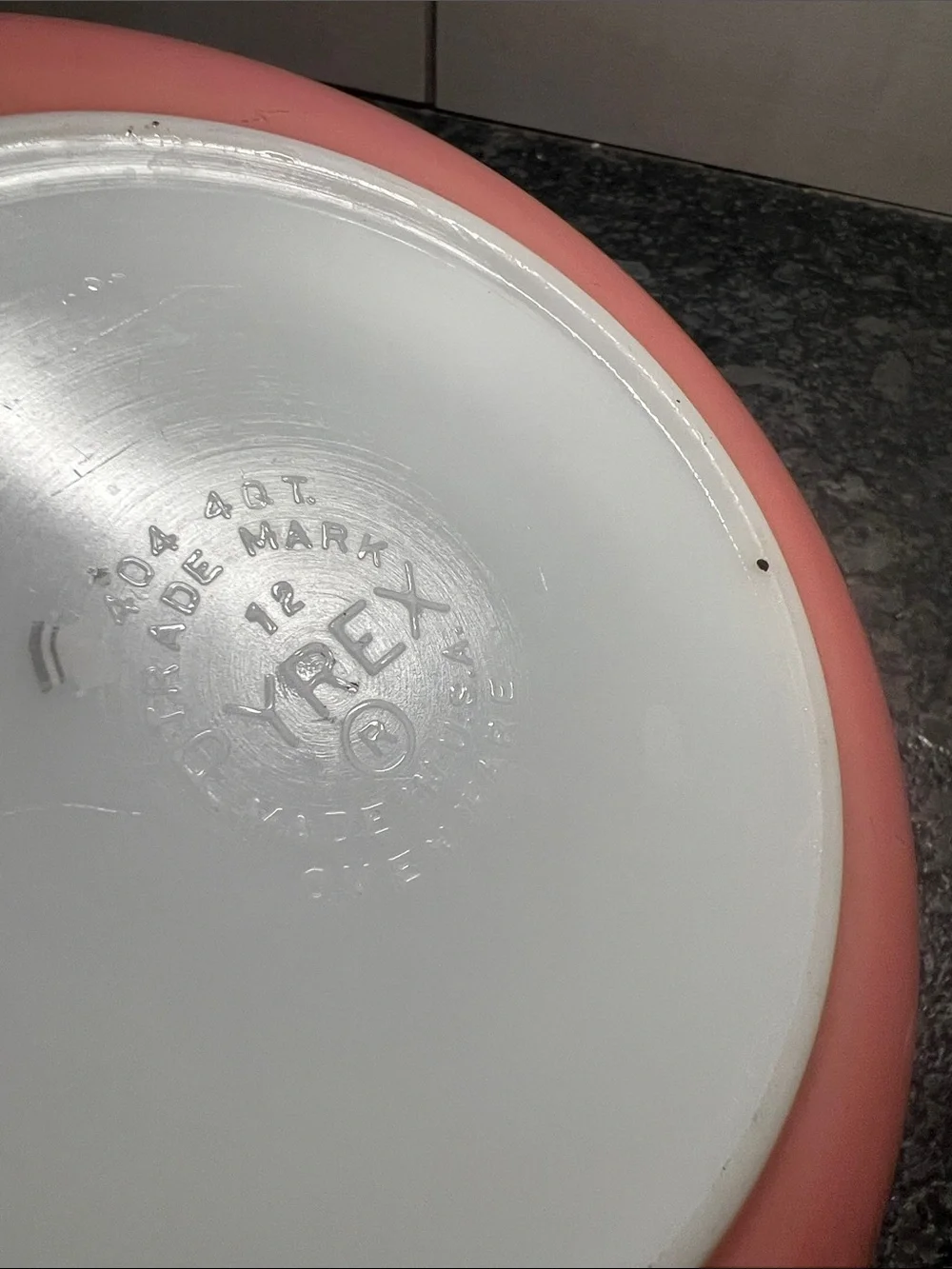 404 Vintage Pyrex Coral Pink  Mixing Bowl with White Interior.